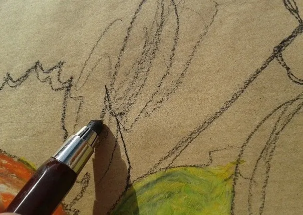 Kursteilnehmer fotografieren ein Rapsfeld